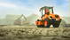 Trilwals van 6,6 ton in actie op een bouwterrein.
